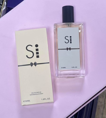 عطر si